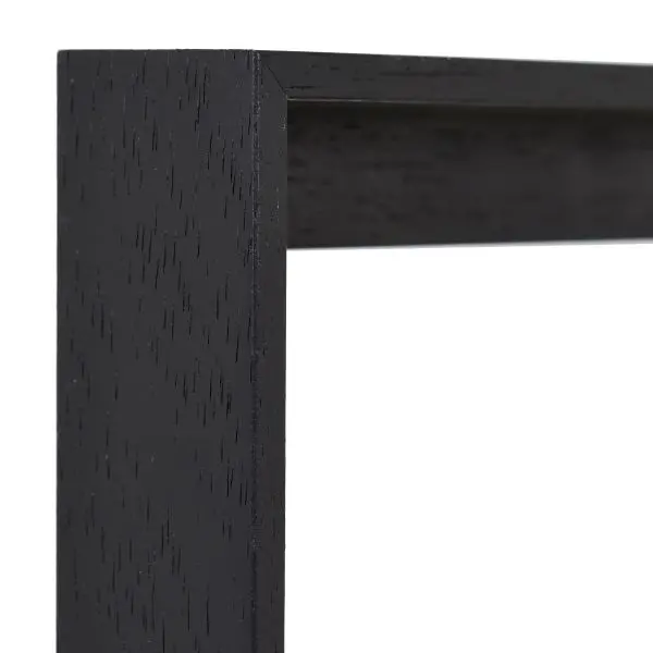 Découvre le détail du coin de ce cadre caisse américaine noir à pores ouverts, parfait pour tes toiles chez MonCadrePréféré.