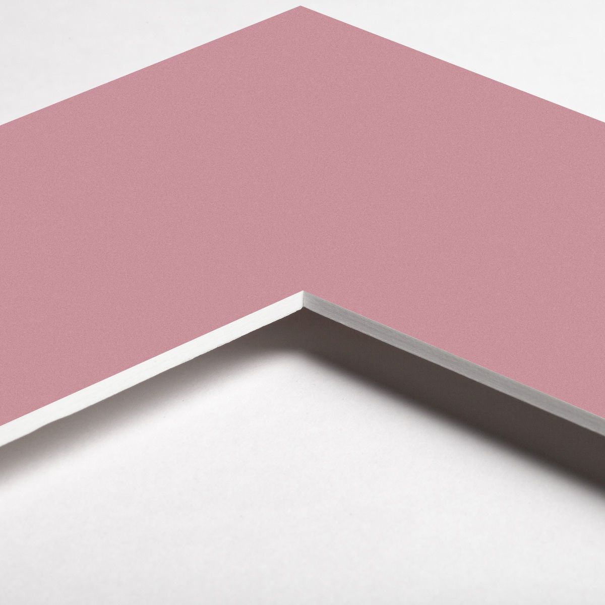Regarde attentivement le coin élégant d'un passe-partout rose. Il ajoutera une touche de couleur à tes cadres MonCadrePréféré.