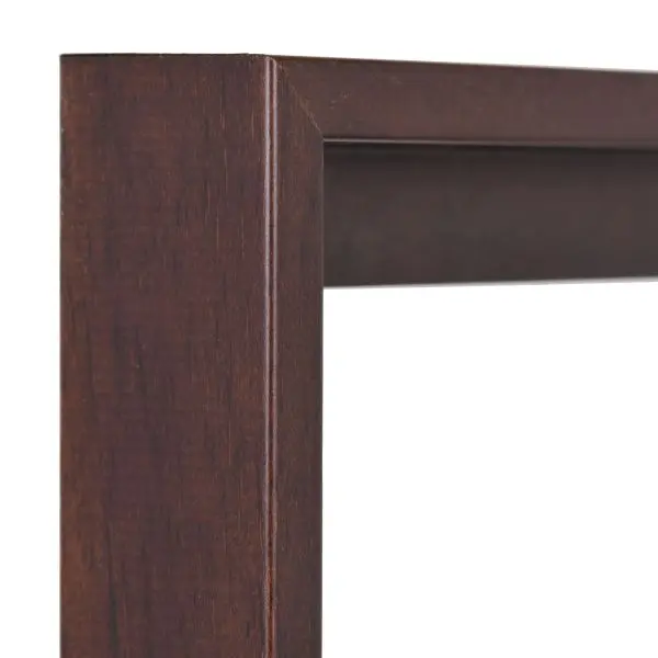 Découvre l'élégante vue d'angle de ce cadre flottant moderne Joline, en bois brun foncé, chez MonCadrePréféré. Idéal pour tes œuvres !