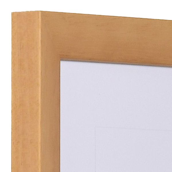 Découvre l'angle élégant de ce cadre photo moderne MonCadrePréféré en bois naturel à pores ouverts.