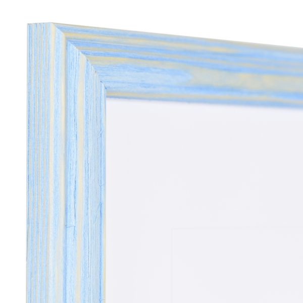 Découvre cet angle de cadre bois bleu pastel, style campagne. Son profil bombé et bord rehaussé sublime ta déco!