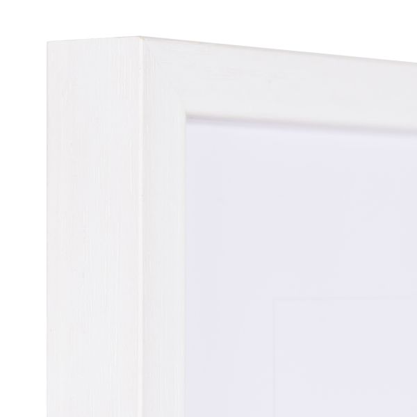 Découvre la vue détaillée du coin de ce cadre photo MonCadrePréféré. C'est un modèle moderne, blanc et très fin en bois.