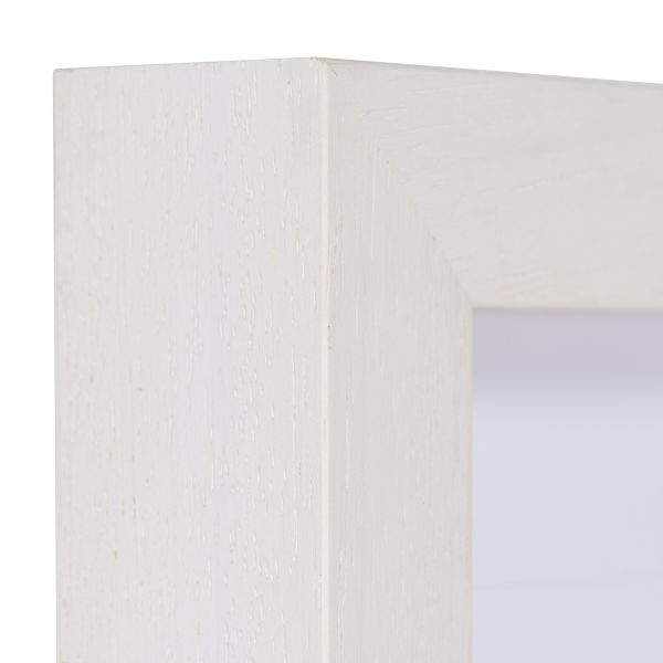 Observe l'angle de ce cadre photo en bois Linda, blanc, à finition pore ouvert, idéal pour tes toiles. Choisis MonCadrePréféré!